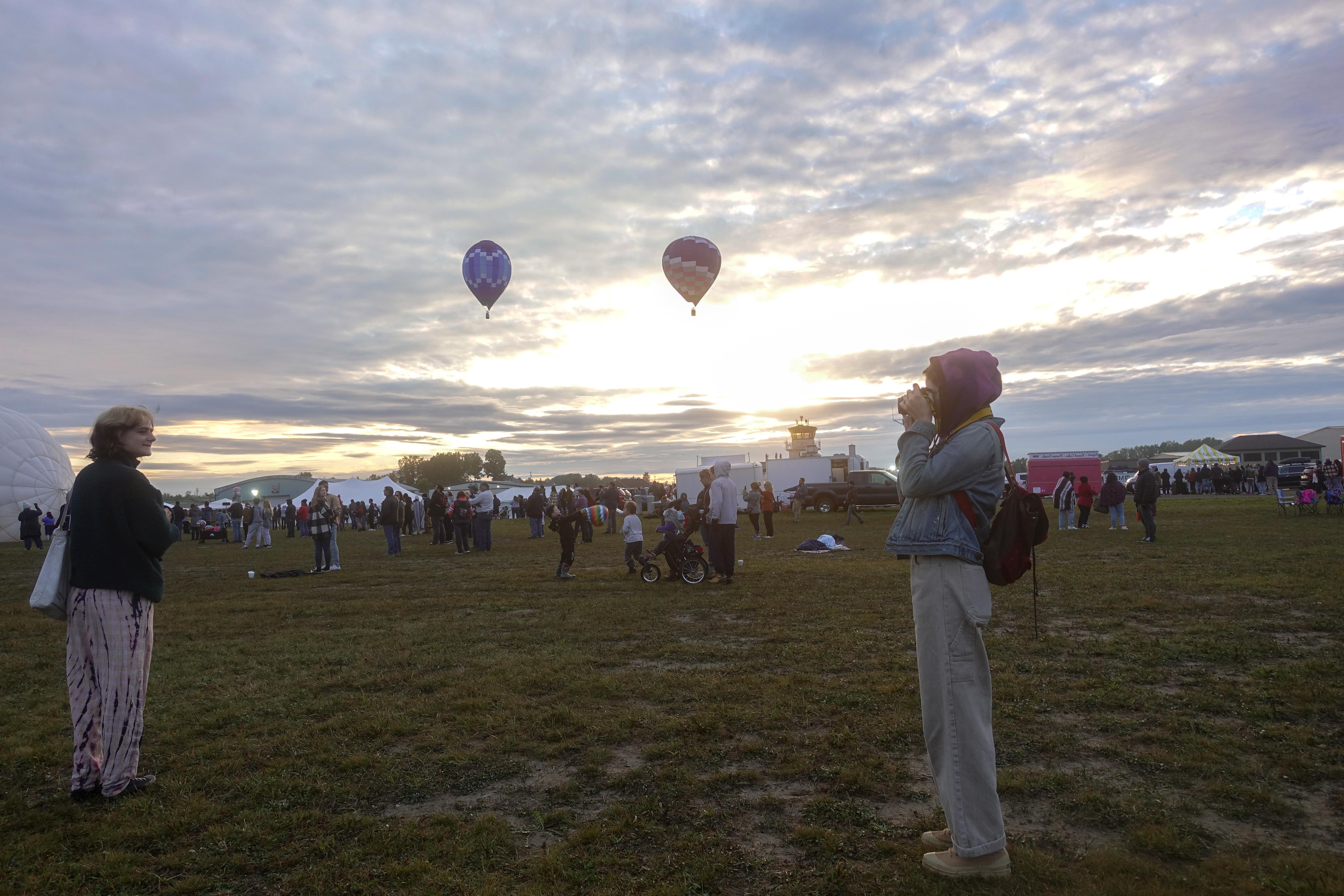 My roommate Renée, left, photographing our friend Cori at the Adirondack Hot Air Balloon Festival.